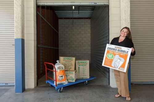 Employee with moving supplies