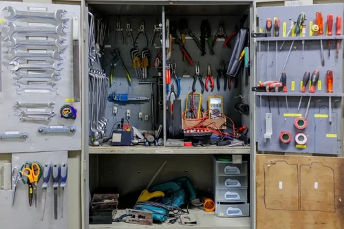 Contractor equipment and hardware in a fill cabinet.