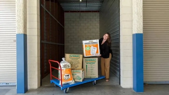 Employee with moving supplies